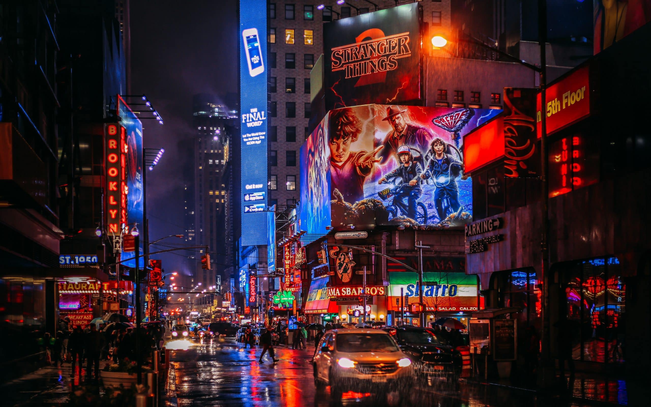 a street in the city during the night