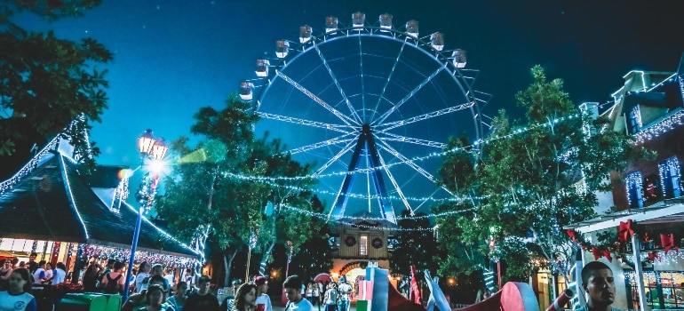 luna park at night to visit after moving to Miami with toddlers