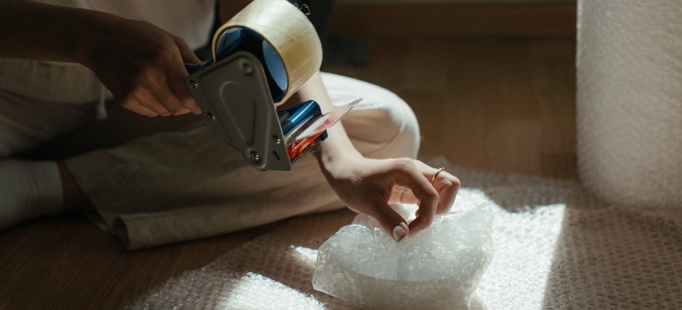 woman taping something