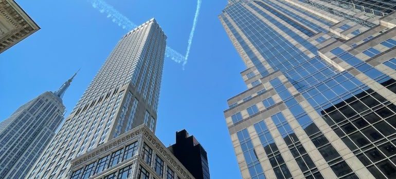 a tall building under the blue sky