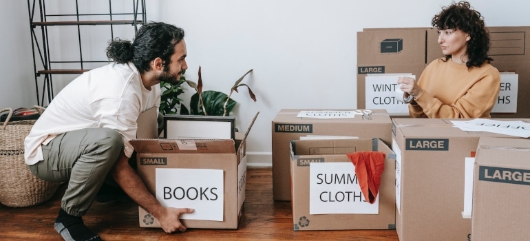 Couple packing books