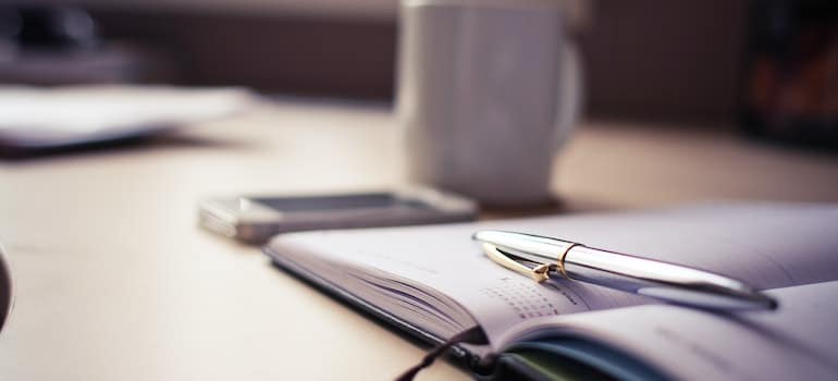 calendar and a mug on table