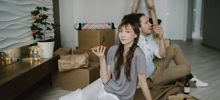 a couple in their new apartment