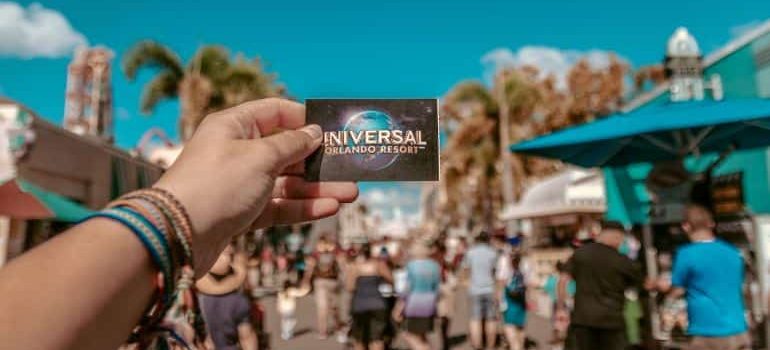 Person holding the ticket to Universal theme park in Orlando Florida.