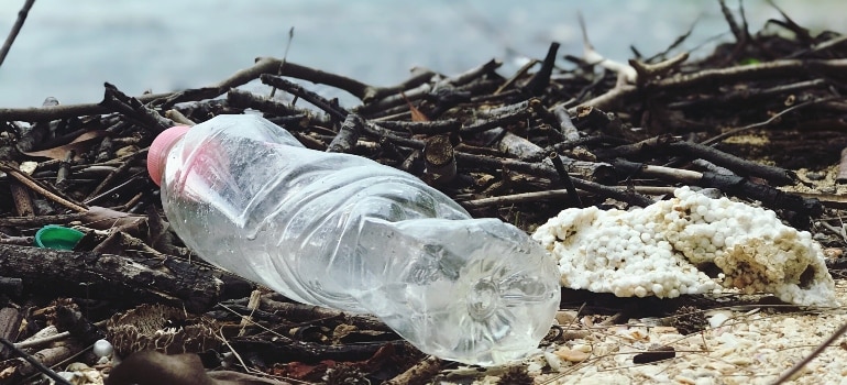 Water bottle on the ground.