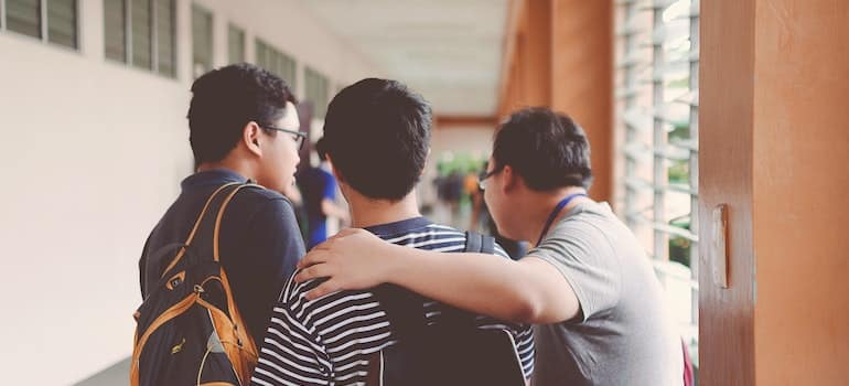 Three high school students spending time together.