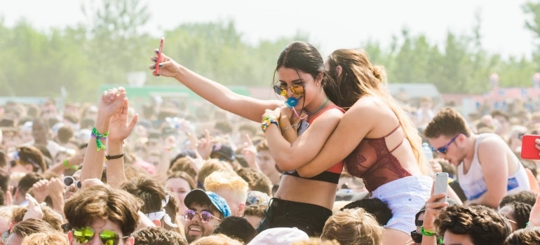 People in the crowd at a festival.