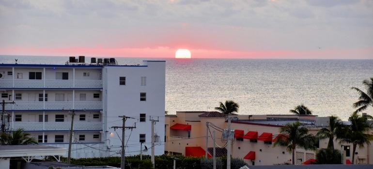 Plan your relocation to Delray Beach while the sun is setting over the ocean.