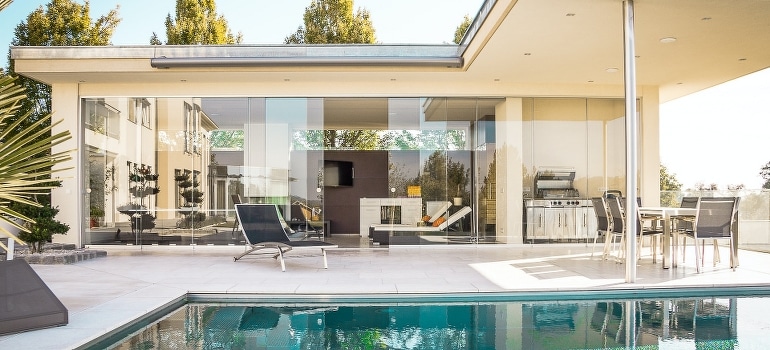 A pool in front of the house- one more reason to invest in real estate in Pompano Beach.