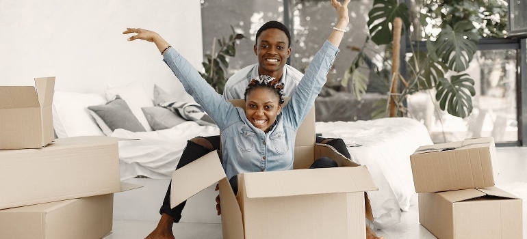 Happy couple getting ready for moving to Parkland