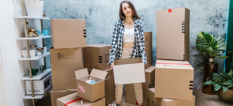 A woman ready to pack and move to Pompano Beach from Fort Lauderdale.