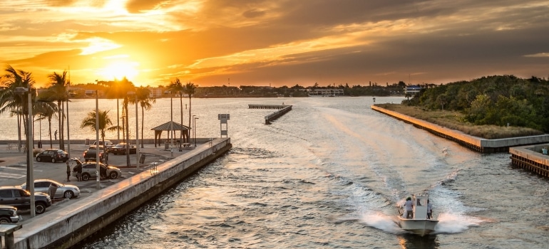 People sailing during sunset