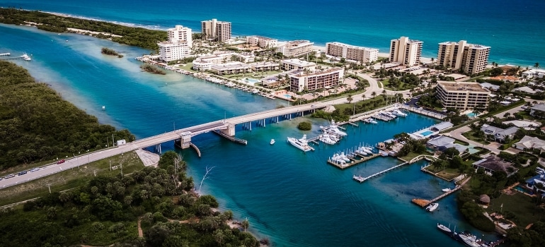 Aerial view of buildings by the water in Jupiter, one of the cities to move to in South Florida.