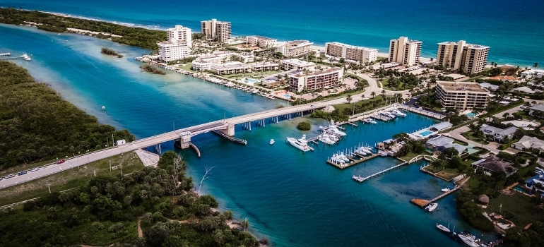 Aerial view of buildings by the water in Jupiter, one of the cities to move to in South Florida. 