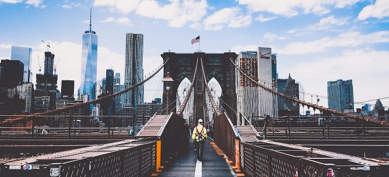 A man walking on the bridge