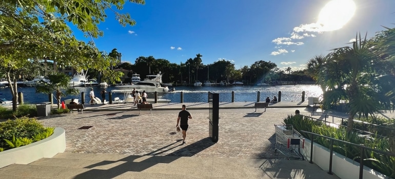 A man walking down the sidewalk and thinking what should he choose - Parkland vs. Margate