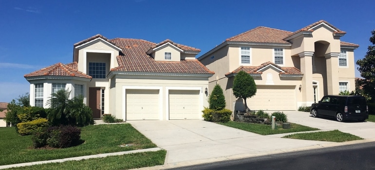 A beige house with a garage, in Florida