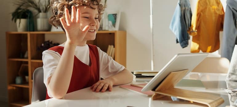 A kid having a video call after leaving Fort Lauderdale