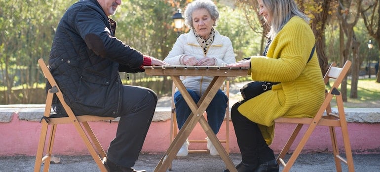 Seniors playing dominoes