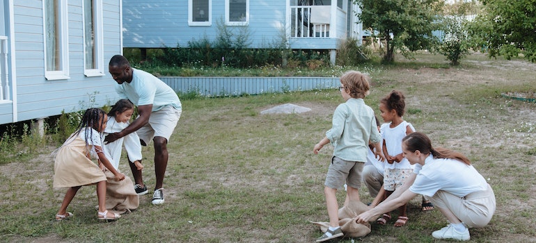 Family playing in the front yard