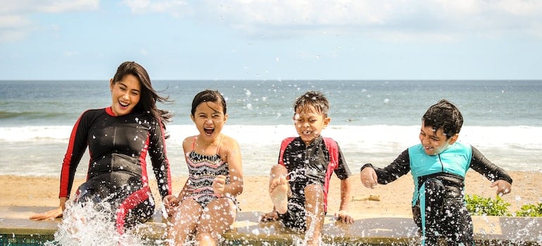 Family playing in the water