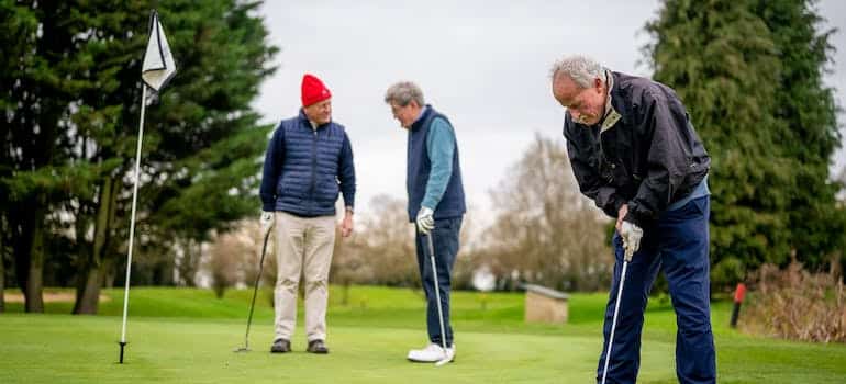 Seniors golfing