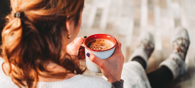 A woman drinking coffee 