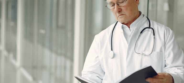 Doctor looking at medical records