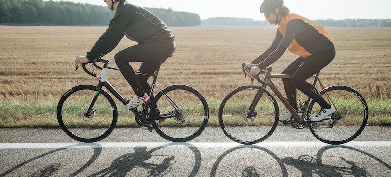 Two people biking