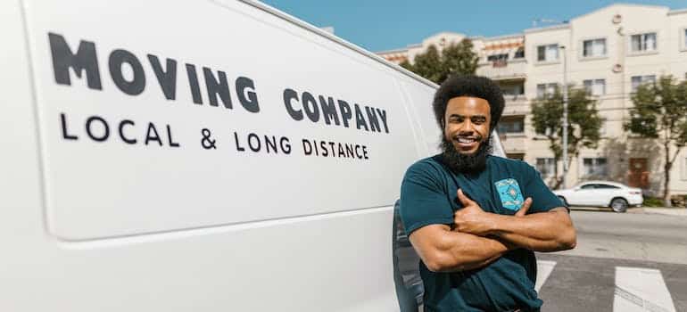 A mover in front of the moving van 