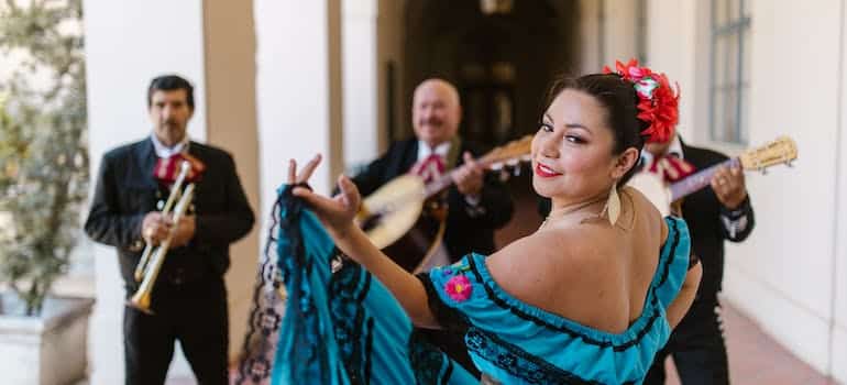 A dancer in a blue dress