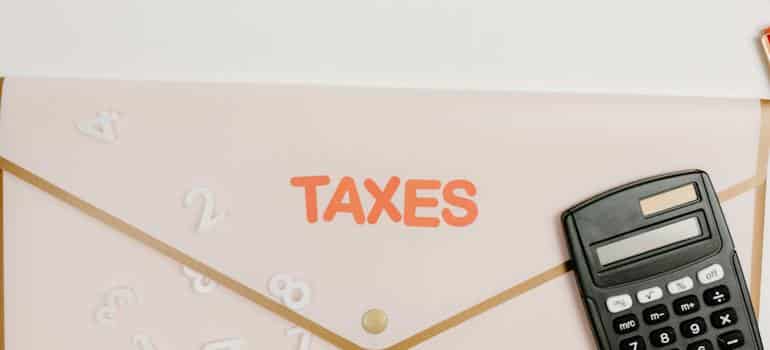 An envelope with taxes written on it