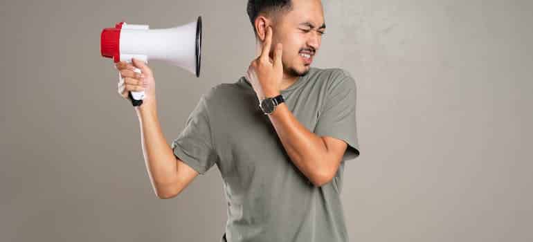 A man holding megaphone