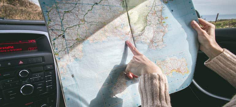 A woman holding a map