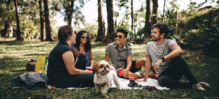 Friends having picnic and enjoying one of the things to do in Boca Raton for newcomers