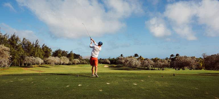 A man playing golf