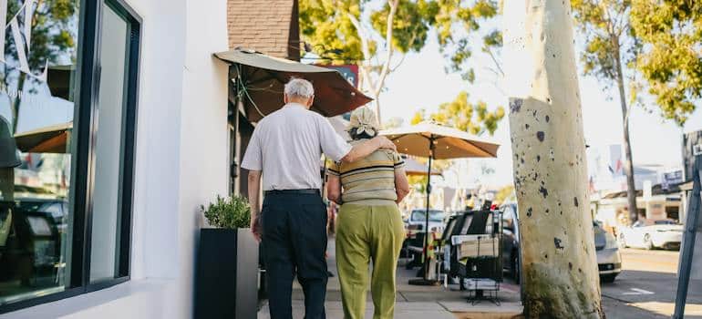 An elderly couple on the street