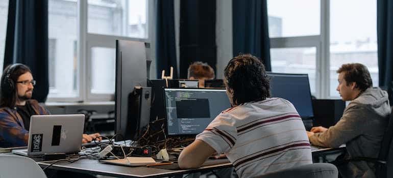 People in the office using laptop 