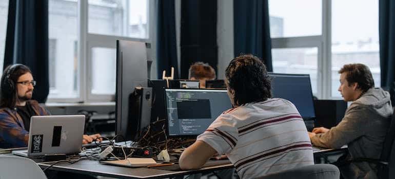 People in the office using laptop