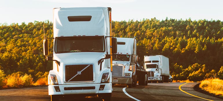 Trucks on the road used to relocate valuables from Florida to California