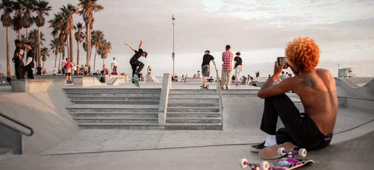 People in skate park in Los Angeles, one of the cities in California Floridians are moving to