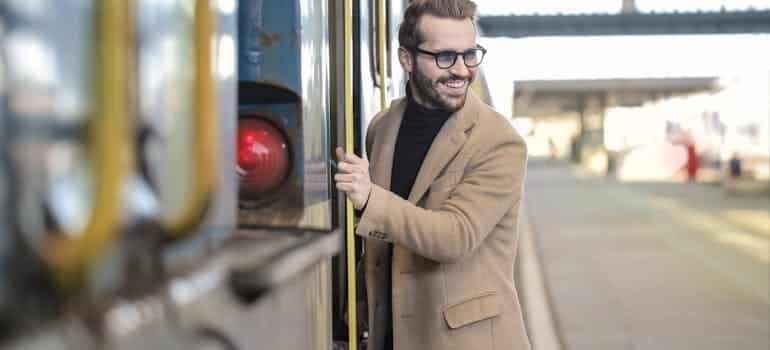 A man entering a train