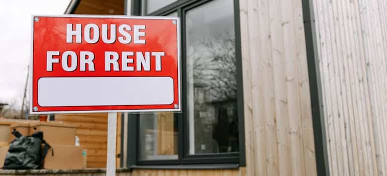 A house to rent sign in one of the affordable places in Broward County