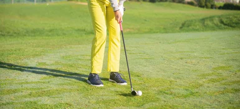 A person playing golf