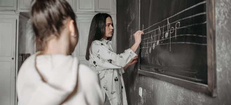 A girl having a music lesson