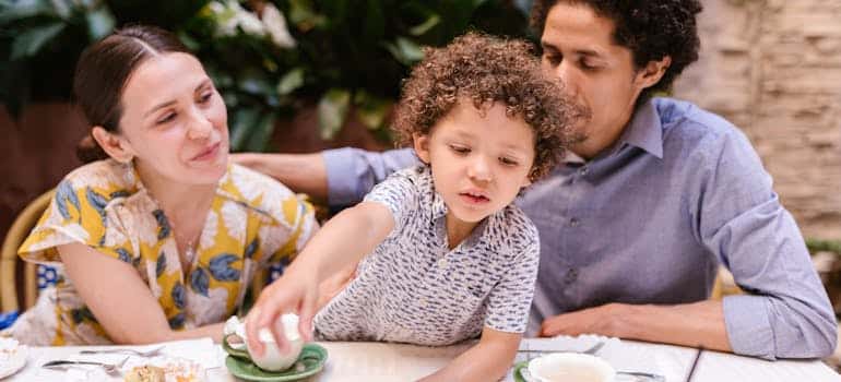 A family eating in the restaurant located in one of the best Florida cities to open a restaurant