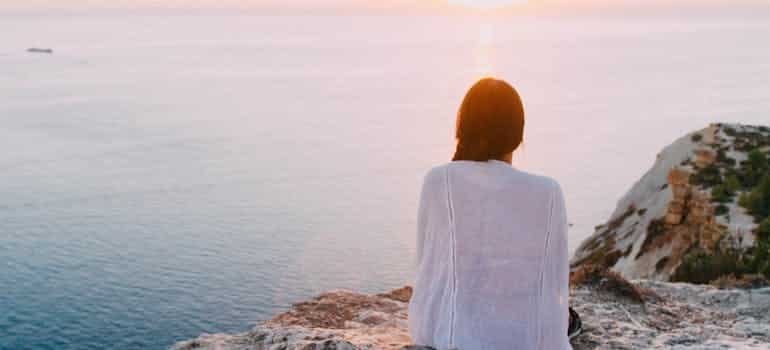 A woman next to the ocean