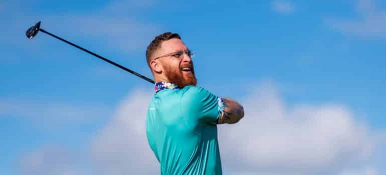 A person golfing 