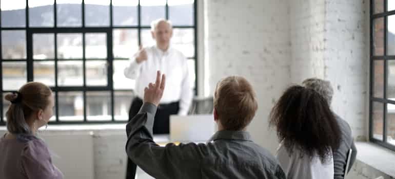 A group of people taking a class