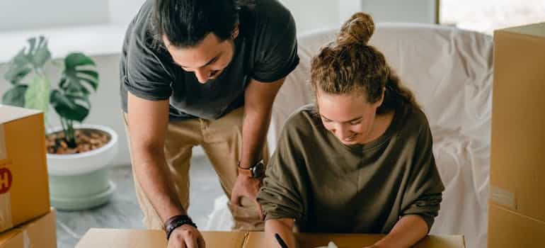 A couple calculating a cost for a long distance relocation from Florida